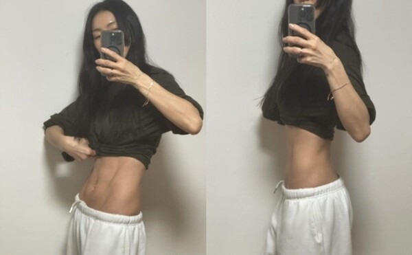 Kahi shows off her '43-year-old body' with strong abs...