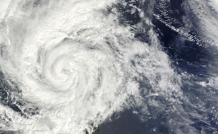 Typhoon breaks up, remembers killing winds