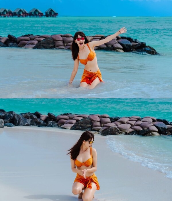 Gujal reveals orange bikini in Maldives...